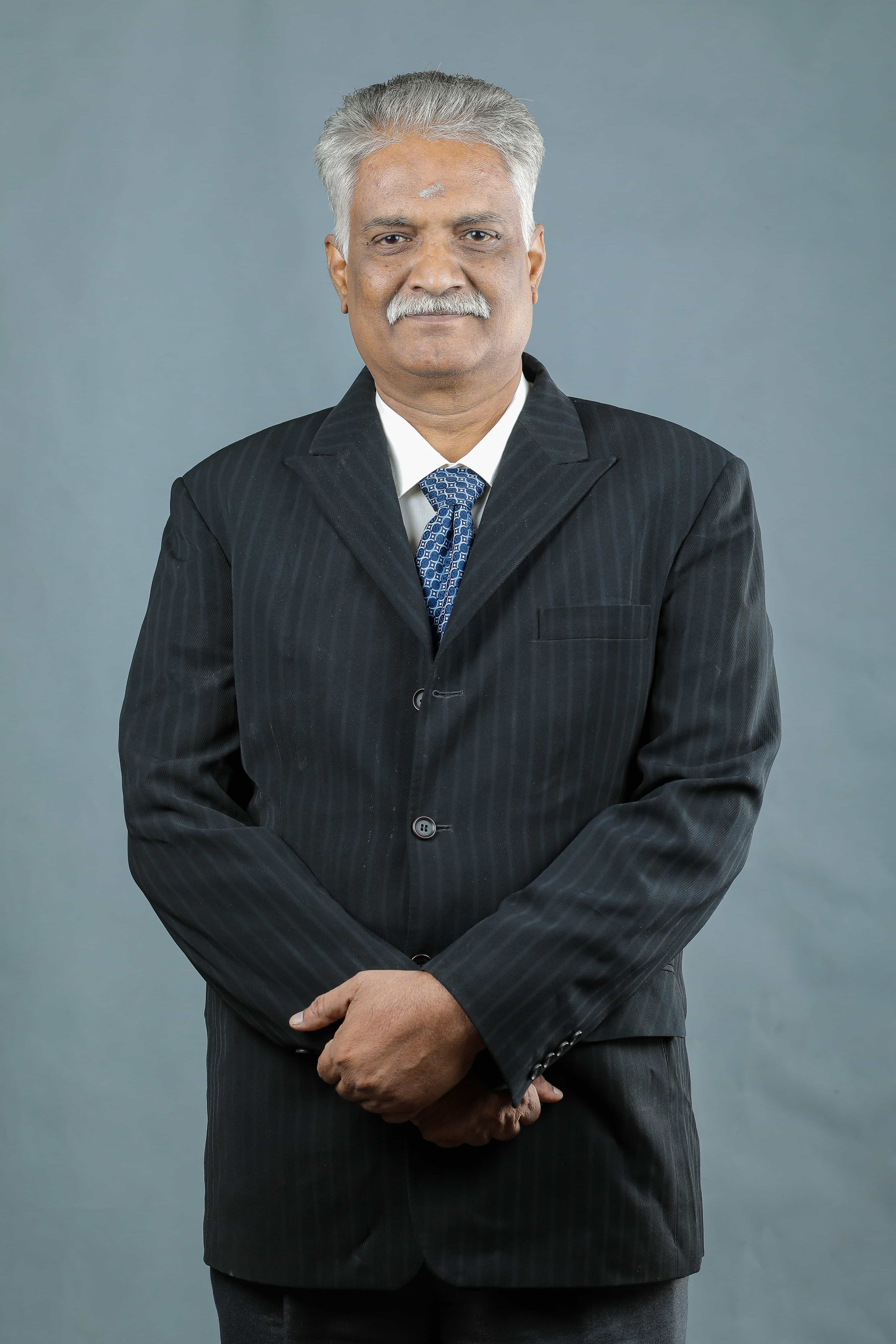 Dr.K.Murugan